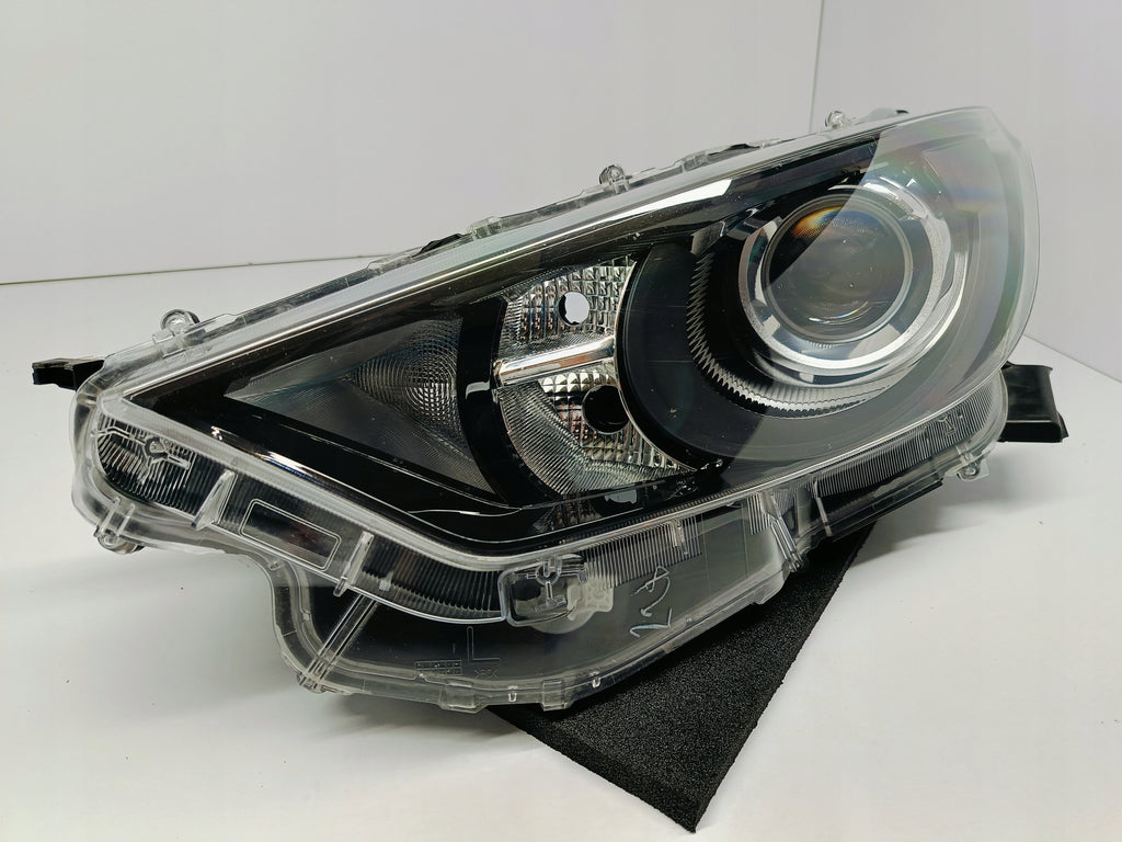 TOYOTA YARIS IV 4 P21 19- LAMPA REFLEKTOR LEWY PRZÓD SOCZEWKA KOITO K0-6 EU