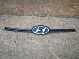 HYUNDAI I10 II 2 16- LIFT ATRAPA GRILL EMBLEMAT ZDERZAKA PRZÓD 86351-B9500