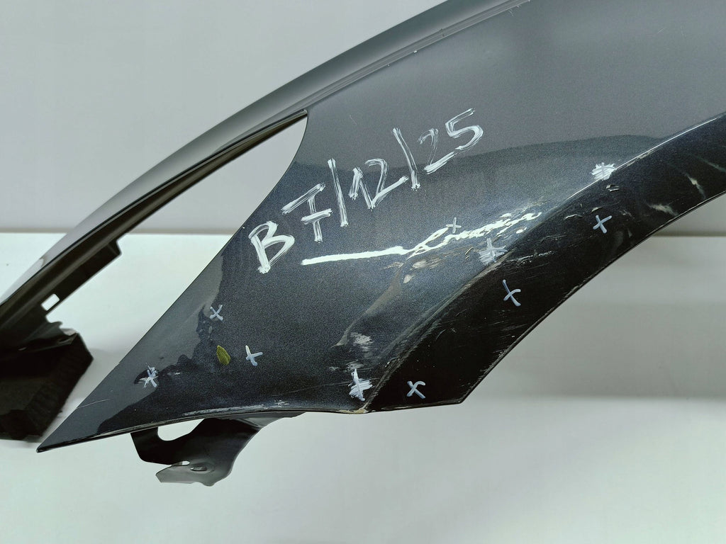 Tesla Model 3 M3 III 17- BŁOTNIK LEWY PRZÓD PRZEDNI 1091094-F