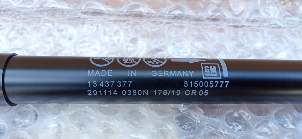 OPEL CASCADA 13- SIŁOWNIK PODNOSZENIA KLAPY BAGAŻNKA NOWY 13437377