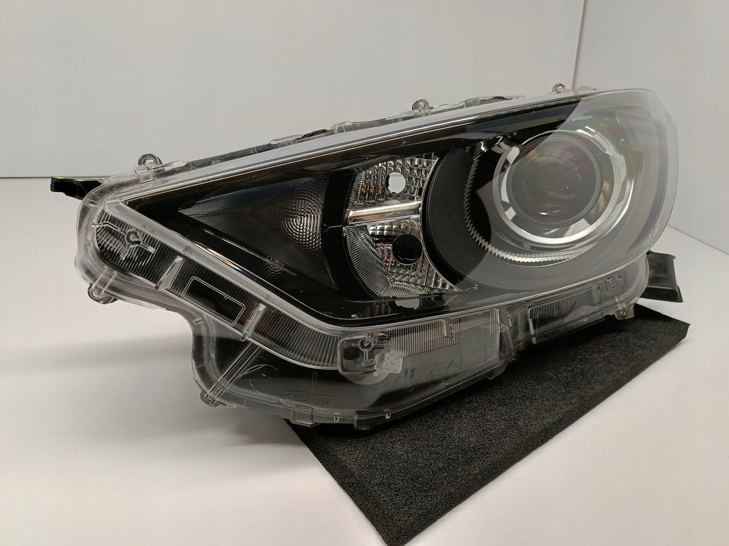 TOYOTA YARIS IV 4 P21 19- LAMPA REFLEKTOR LEWA PRZÓD SOCZEWKA KOITO K0-6 EU