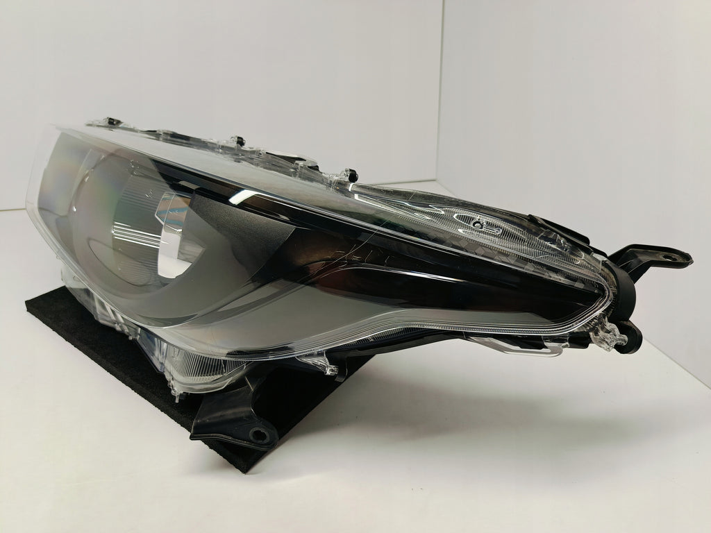TOYOTA YARIS IV 4 P21 19- LAMPA REFLEKTOR LEWY PRZÓD SOCZEWKA KOITO K0-6 EU