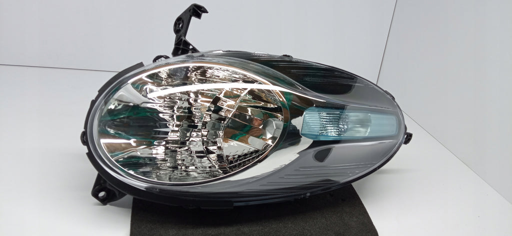 NISSAN MICRA K12 LIFT 07- LAMPA PRAWA PRZÓD PRZEDNIA ZWYKŁA H4 26010BG10B